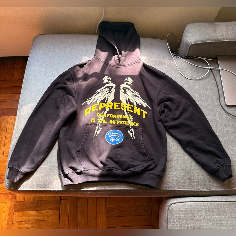Used Represent hoodie with yellow and blue graphic oversize small, fit like a M
